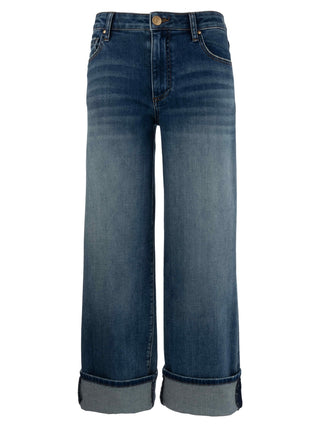 A pair of high-waisted blue jeans with a rolled-up hem, displaying the texture and color of the denim fabric.