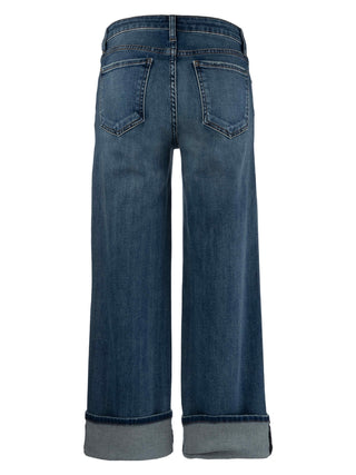A pair of high-waisted blue jeans with a rolled-up hem, displaying the texture and color of the denim fabric.