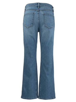 Blue medium wash jeans on a white background