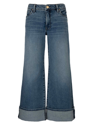 A pair of high-rise, wide leg roll-up jeans with a regular hem.