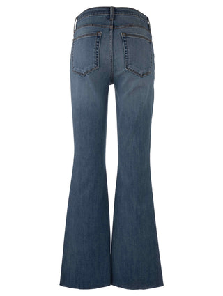 Blue flared jeans on a white background