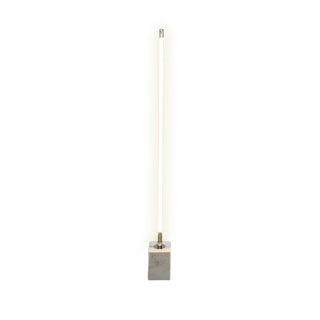 Tall, thin light fixture with a square base on a white background
