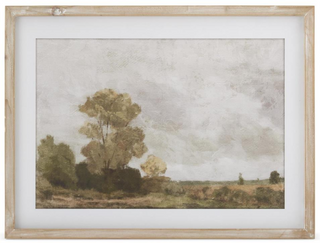 Framed landscape painting with trees and a field