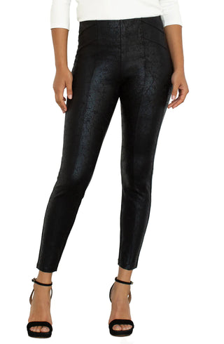 A model wearing pull on Liverpool black pants with a crackle effect and pleated detailing.