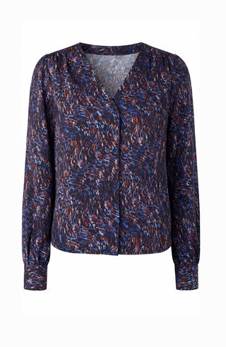 A women's long-sleeve blouse with a V-neckline, featuring an abstract, textured multicolor pattern in navy, blue, red, and white, displayed on a clean white background. Liverpool Blue & Brown Long Sleeve Blouse with Necktie