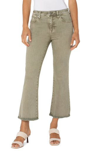 A pair of cropped flare jeans with fray hem in an olive green color.