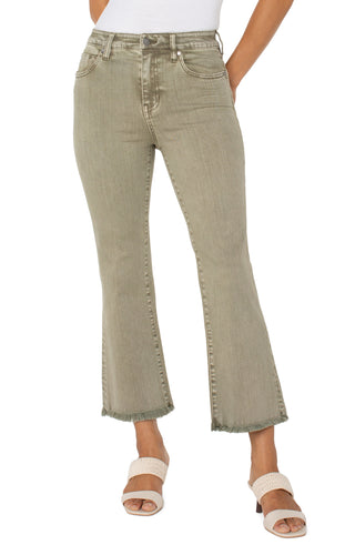 A pair of cropped flare jeans with fray hem in an olive green color.
