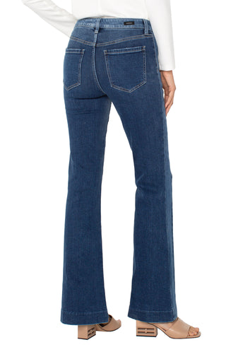 Liverpool Hannah Flare Blue jeans worn by a person on a white background. Liverpool Hannah Flare with Blocking Details, Ridgely
