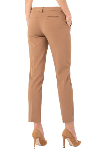 Tan pants worn by a person on a white background. Liverpool Kelsey Trouser in Maple