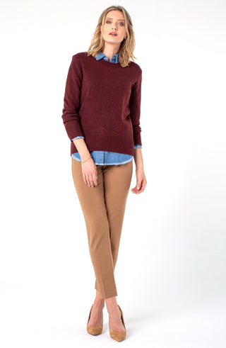 Woman wearing a burgundy sweater, blue shirt, and tan pants on a white background. Liverpool Kelsey Trouser in Maple