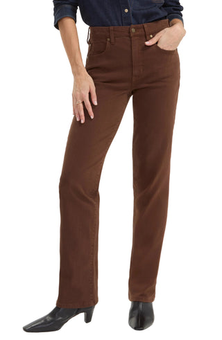 Liverpool Kennedy Straight with Comfort Waist in Carob Brown
A person wearing brown straight-leg jeans with a navy shirt and black pointed-toe heeled boots, shown from the waist down against a light gray studio background.