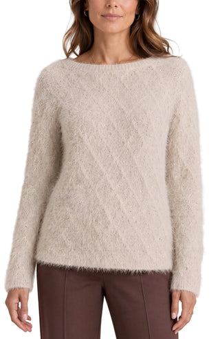 Liverpool Long Sleeve Boatneck Sweater in Light Camel glitter glimmer
A woman wearing a fuzzy, long-sleeve knit sweater in a light oatmeal beige color, paired with brown trousers, against a neutral studio background.