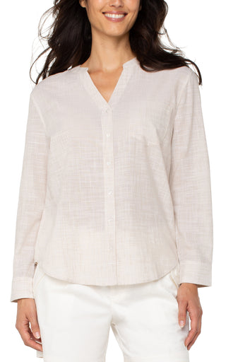 A long sleeve button front woven shirt with a banded collar in a light tan and white color combination.