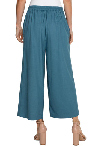 Ocean blue wide leg sailor crop pants with a faux 6-button front detail, elastic back waistband, and front pleat.