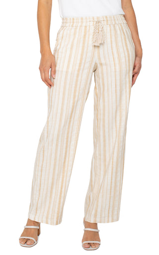 A pair of wide leg striped pants with a drawstring waist in a hazelnut cream color.