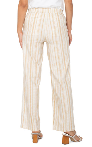 A pair of wide leg striped pants with a drawstring waist in a hazelnut cream color.