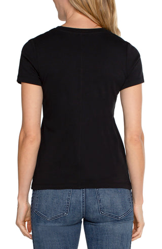 A model wearing a Liverpool scoop neck tee in black with a medium wash denim jean.