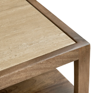 A wooden bedside table with a brown stain finish, featuring two drawers with handles and a cream stone top.