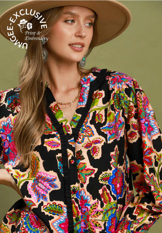 vibrant, multicolored bohemian-style embroidered blouse with black trim red pink turquoise blue boho beige paisley