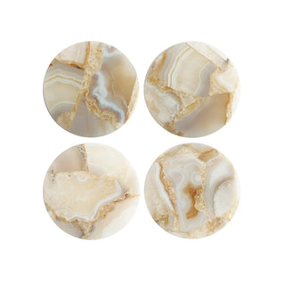 A set of four round agate coasters with a multi-color pattern. Multi Color 4" Round Agate Coasters