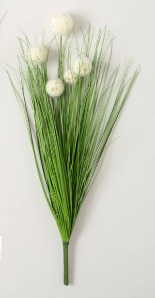 Two artificial onion grass bushes with green stalks and either green or cream seed pods, displayed against a white background.