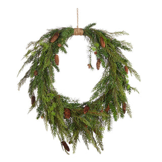 Oval Cedar and pine wreath 
A green oval wreath made of cedar and pinecones, hanging against a white background. 