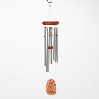 A pet sympathy windchime featuring silver aluminum tubes and a teak finish wooden windcatcher with an engraving.