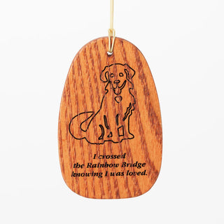 A pet sympathy windchime featuring silver aluminum tubes and a teak finish wooden windcatcher with an engraving.