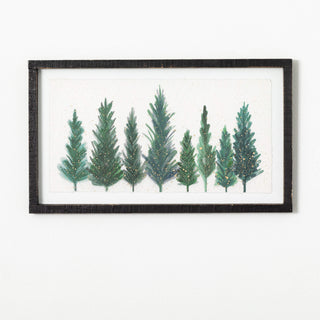 Framed artwork of green trees on a white background