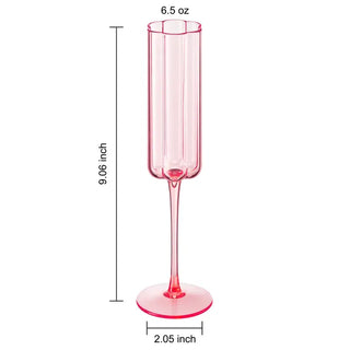 Pink champagne flute with measurements on a white background