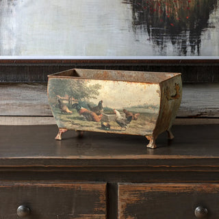 Rustic metal planter with chicken design on a wooden surface farmhouse antique metal french country