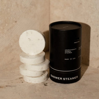 Preston Shower Steamer, Cooling Eucalyptus displayed in a stack outside of the product box