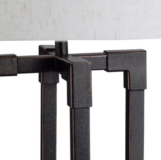 Close-up of a black metal lamp with a white background