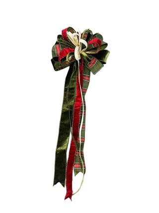 Ralph Lauren Tree Topper Bow
A large Christmas bow made of green plaid, red velvet, and cream ribbon The bow has long trailing ribbons gold edge 