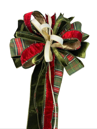 Ralph Lauren Tree Topper Bow
A large Christmas gift bow made of green velvet ribbon, red velvet ribbon, and red-and-green plaid ribbon, tied with a cream ribbon tree topper