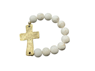Bracelet with white beads and a gold cross on a white background Revival White Bracelet