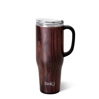 A SWIG branded bourbon barrel mega mug with a capacity of 40oz. The mug is made of stainless steel and has a wooden finish with a black plastic handle and a stainless steel lid.