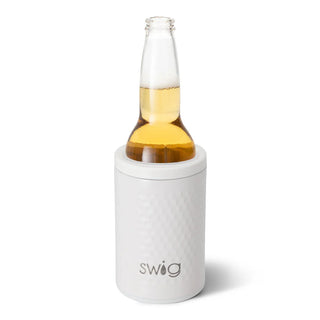 A white SWIG golf ball can and bottle cooler with a textured dimple design, featuring a silicone base and a lid resembling a golf ball.
