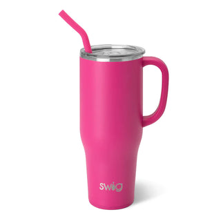 A hot pink stainless steel mega mug with a silicone base and a pink straw.