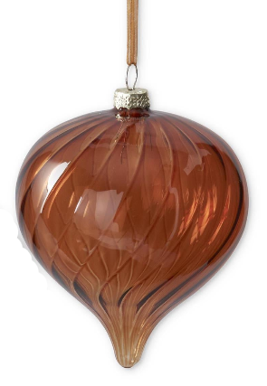 A close-up of a teardrop-shaped amber glass ornament with a textured ribbed pattern and a silver cap, hanging against a white background.