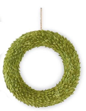 A green leafy wreath hanging against a white background, with a small hanging loop at the top.