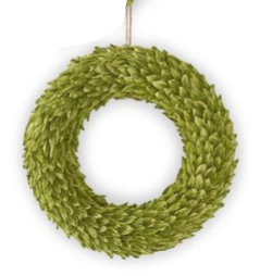 A circular green leafy wreath hanging against a plain white background, with partial matching wreaths visible at the top corners.