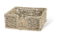 A natural seagrass cocktail napkin caddy.