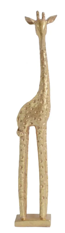 Decorative gold giraffe figure on a white background