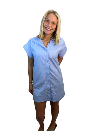 Woman wearing a light blue dress