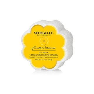 A Spongellé Sweet Patchouli Spongette in the shape of a flower with a yellow and white color scheme, displaying product information on its petals.