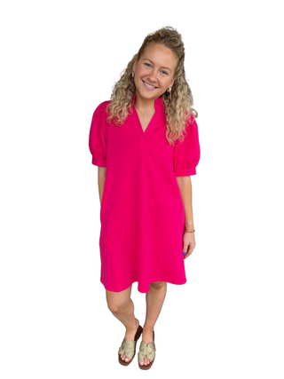 Woman in a bright pink dress 