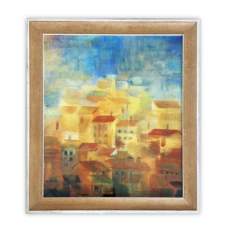 A framed artwork depicting a vibrant sunset over a Mediterranean hillside with buildings in the foreground.