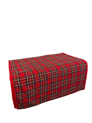 A red tartan plaid fabric, Christmas table runner. Tartan Traditions Double-Sided Table Runner