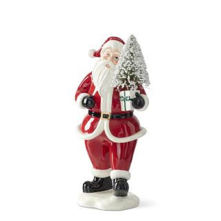 Traditional Santa Holding a Package & Bottle Brush Tree